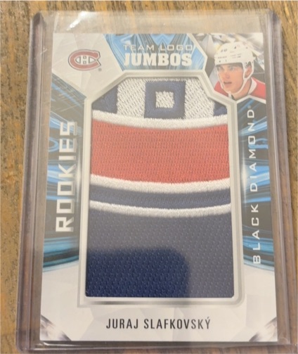 2022-23 Upper Deck Black Diamond Rookies Team Logo Jumbos #RTL-SL Juraj Slafkovský — front