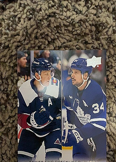 2024-25 Upper Deck Series 2 Nathan MacKinnon Auston Matthews Checklist — front