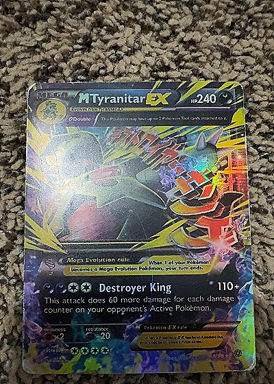 2015 Pokémon #43/98 M Tyranitar — front