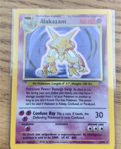 1999 Pokémon Base Set #102 Alakazam — front