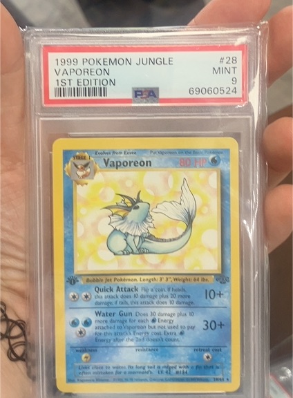 1999 Pokémon Jungle #28 Vaporeon — front