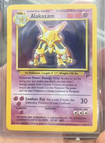 1999 Pokémon Base Set #1 Alakazam — front