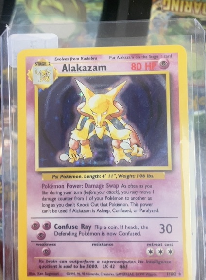 1999 Pokémon Base Set #1 Alakazam — front