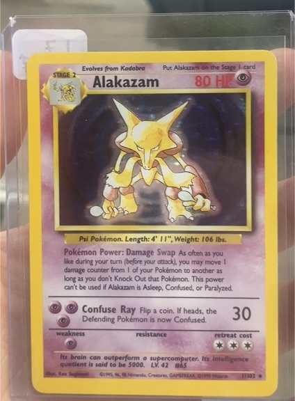 1999 Pokémon Base Set #1 Alakazam — front