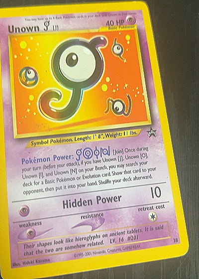 2001 Wizards Black Star Promo #38 Unown J — front