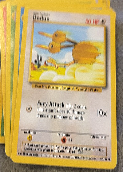 1999 Wizards of the Coast #48/102 Doduo — front