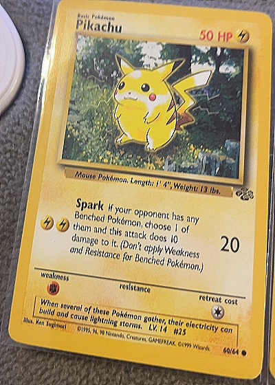 1999 Wizards of the Coast #60/64 Pikachu — front