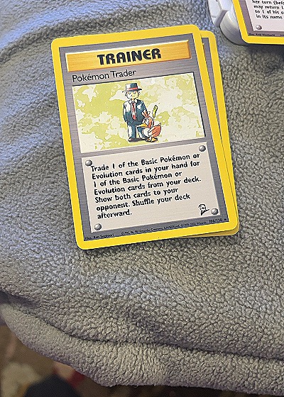 1999 Wizards of the Coast #77/102 Pokémon Trader — front