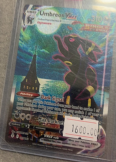 2021 Pokémon #215/203 Umbreon — front