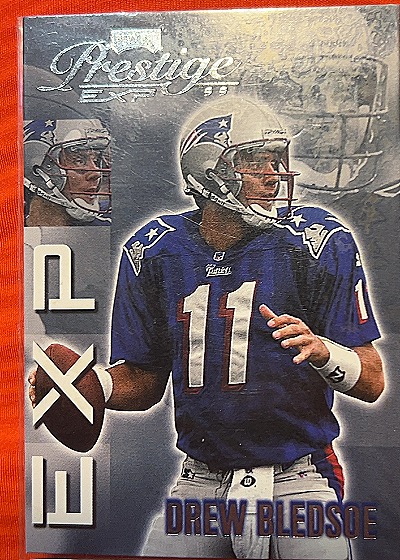 1999 Playoff Prestige #EX124 Drew Bledsoe — front