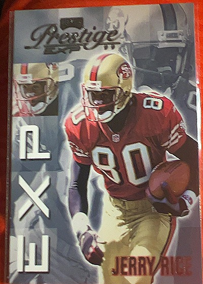 1999 Playoff Prestige #EX89 Jerry Rice — front