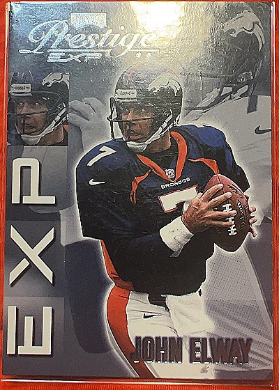 1999 Playoff Prestige #EX164 John Elway — front