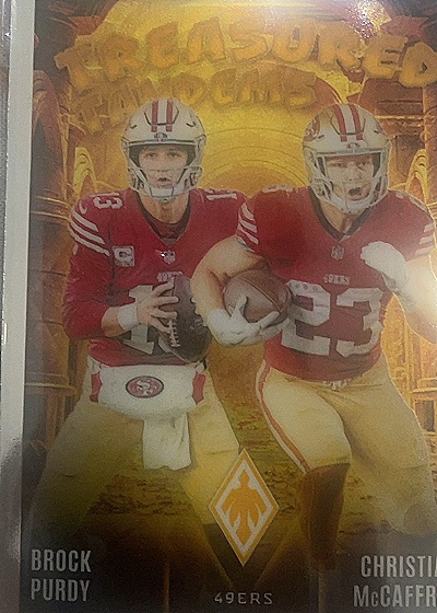 2024 Panini Phoenix #TT-49 Brock Purdy & Christian McCaffrey — front