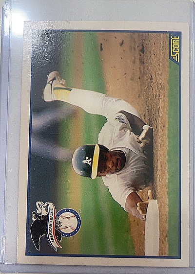 1990 Score #698 Rickey Henderson — front