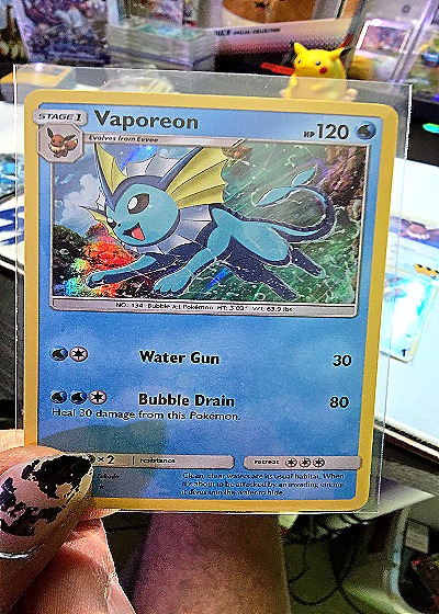 2019 Pokémon TCG Hidden Fates #18 Vaporeon — front