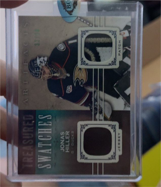 2014-15 Upper Deck Artifacts Treasured Swatches #TS-JH Jonas Hiller — front