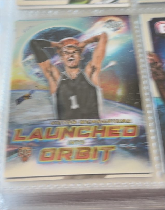 2023-24 Topps Cosmic Chrome #LIO-1 Victor Wembanyama Launched Into Orbit — front
