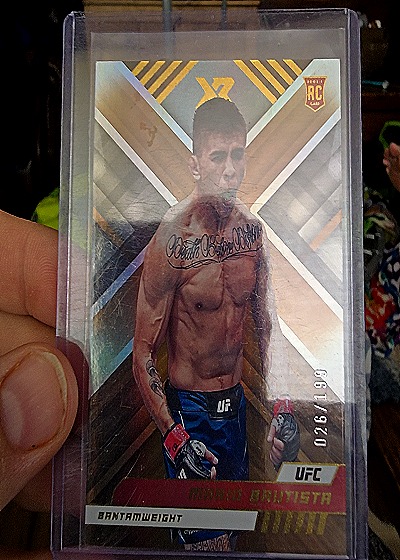 2023 Panini Chronicles XR UFC Mario Bautista #297 — front