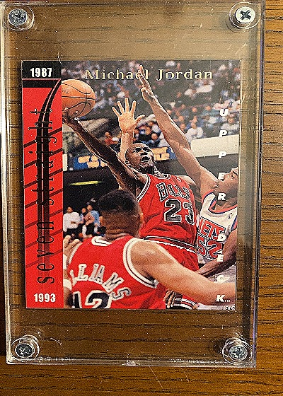 1993 Upper Deck #SP3 Michael Jordan / Wilt Chamberlain Seven Straight Scoring Titles — front