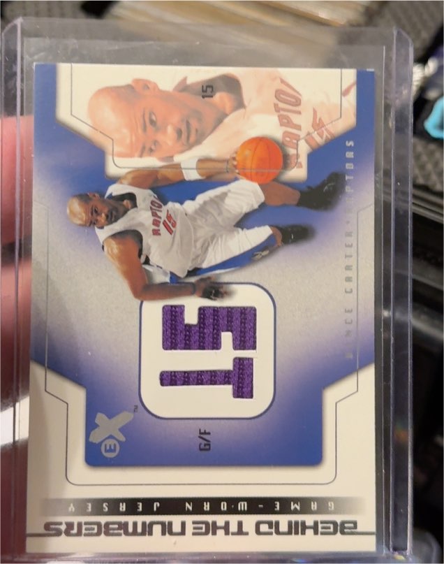 2003-04 Fleer E-X Behind the Numbers Jersey #15 Vince Carter — front
