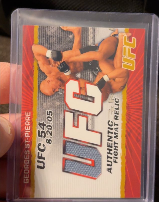 2009 Topps UFC Round 2 UFC 54 Georges St-Pierre Authentic Fight Mat Relic — front