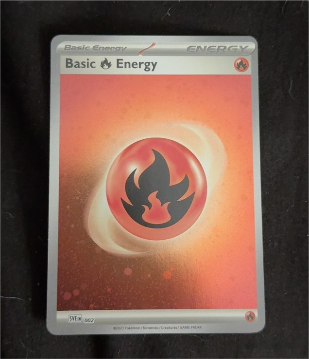 2023 Pokémon Scarlet & Violet 002 Basic Fire Energy Cosmos Holo — front