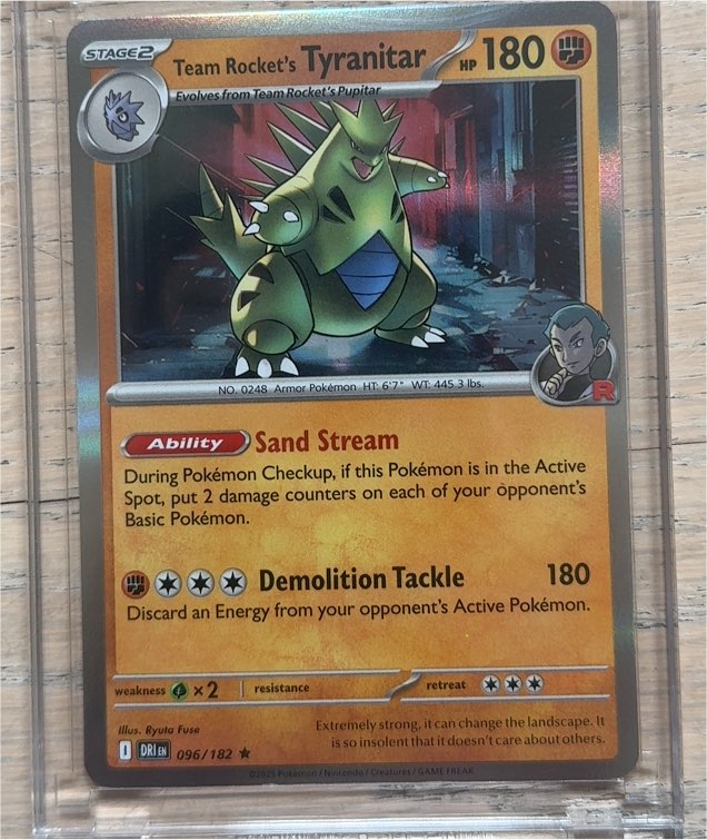 2025 Pokémon #096 Team Rocket's Tyranitar — front