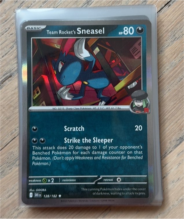 2025 Pokémon #128 Team Rocket's Sneasel — front
