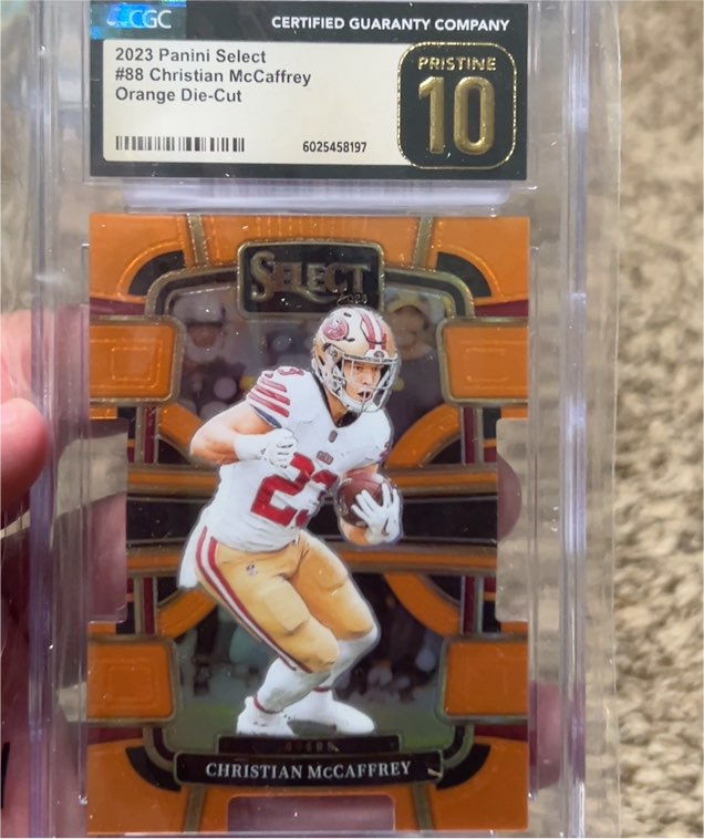 2023 Panini Select #88 Christian McCaffrey Orange Die-Cut — front