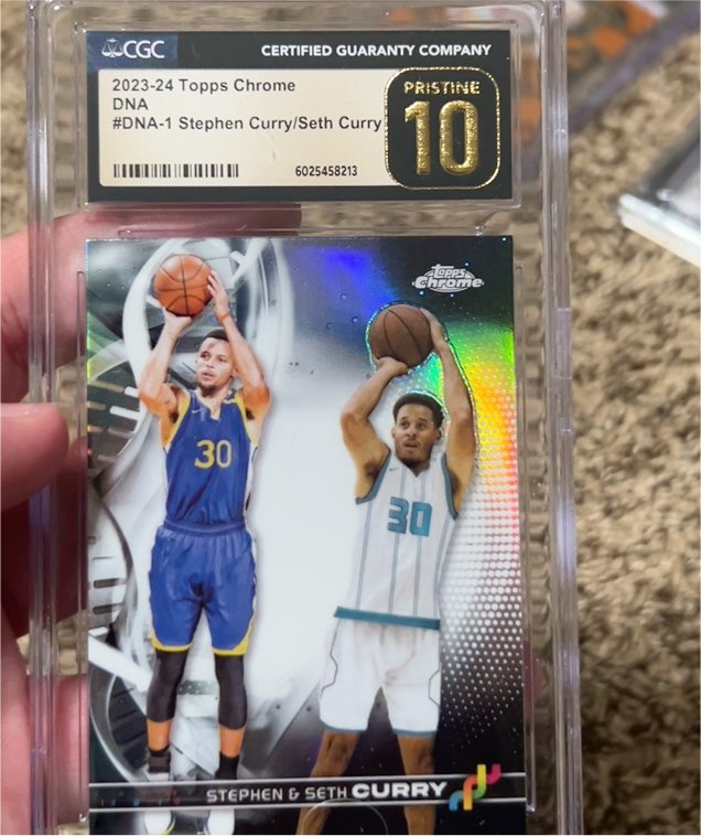 2023-24 Topps Chrome #DNA-1 Stephen Curry/Seth Curry — front