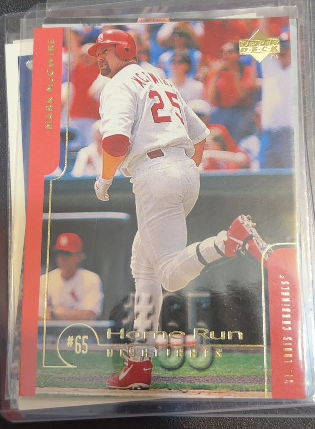 1999 Upper Deck Challengers for 70 #65 Mark McGwire — front