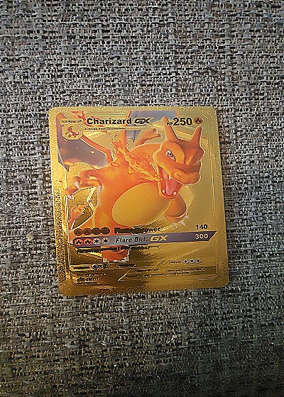 2019 Pokémon TCG Charizard GX #SM211 — front