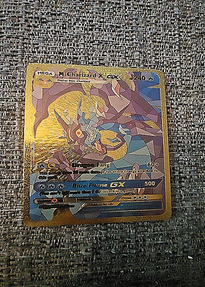 2017 Pokémon SM211 Mega Charizard GX Gold Secret Rare — front