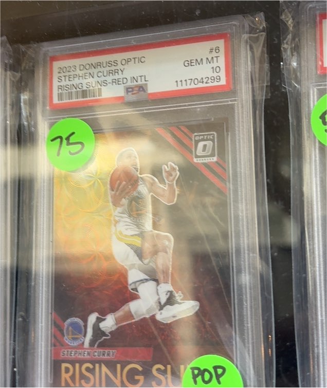 2023 Donruss Optic #6 Stephen Curry Rising Suns-Red Intl — front