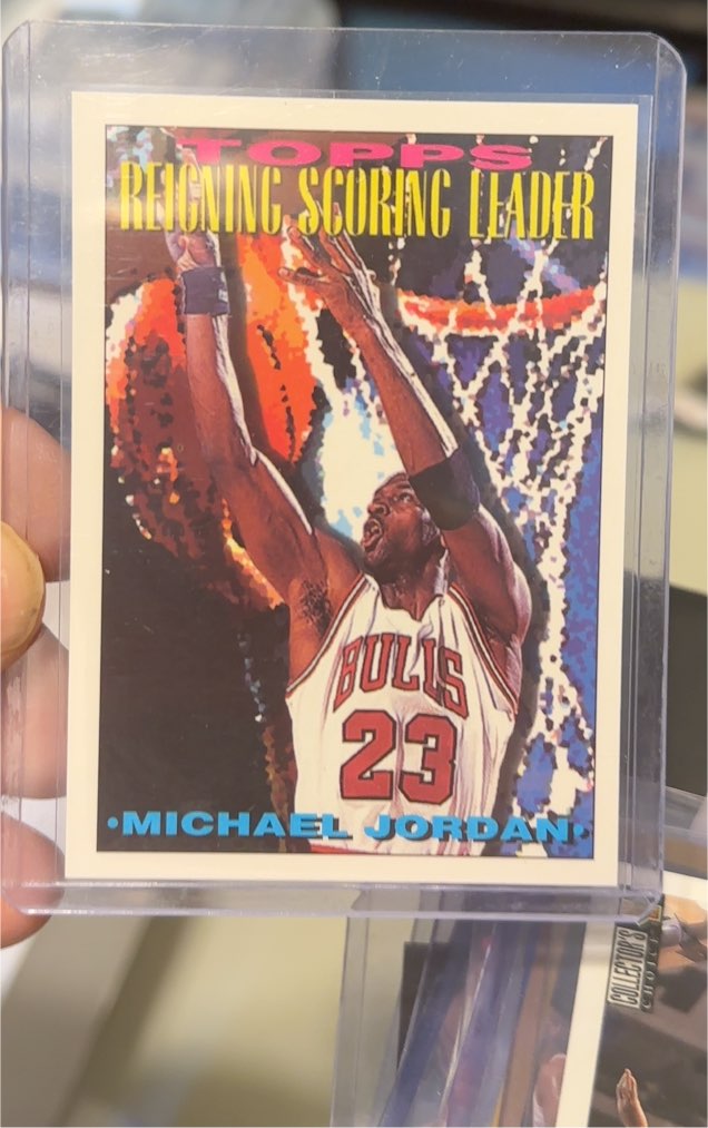 1993-94 Topps #384 Michael Jordan Reigning Scoring Leader — front