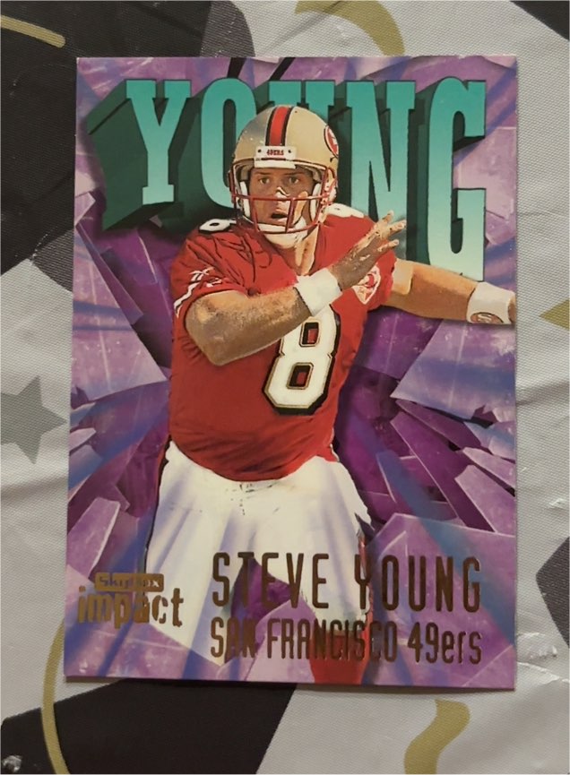 1997 SkyBox Impact #25 Steve Young — front