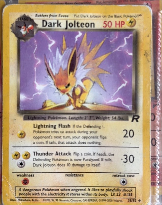 1999 Team Rocket #38 Dark Jolteon — front