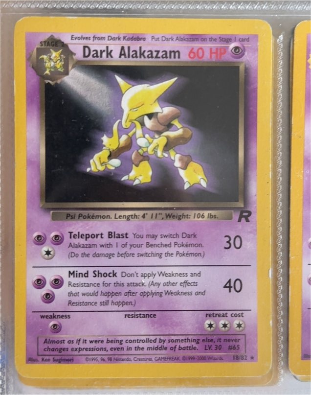 1999 Pokémon Team Rocket #18 Dark Alakazam — front