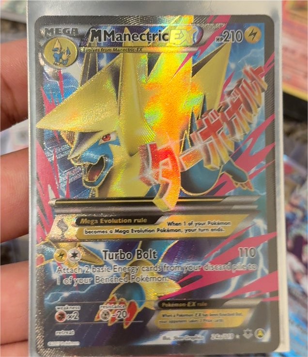 2014 Pokémon TCG XY Phantom Forces #24a/119 M Manectric EX — front
