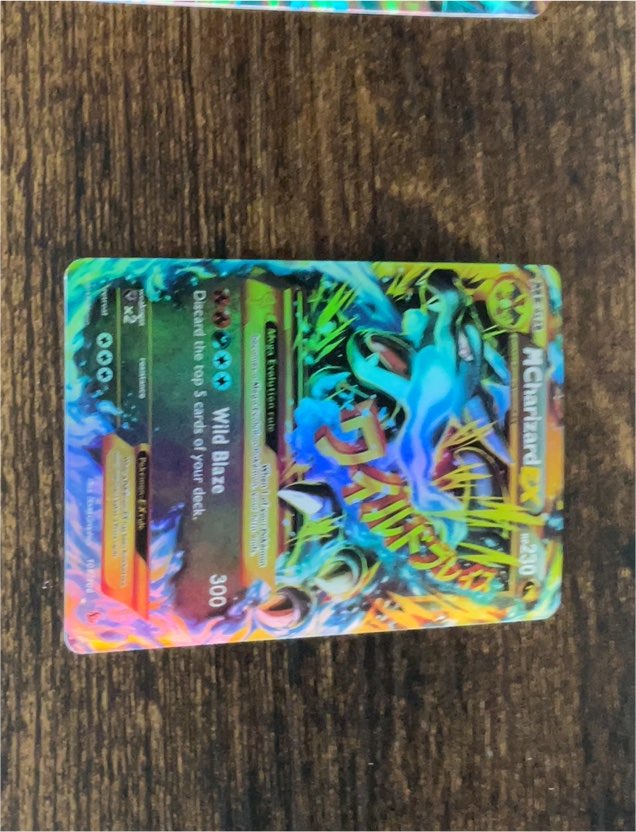 2014 Pokémon TCG XY Flashfire #69 Mega Charizard EX — front
