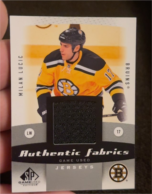 2010-11 SP Game Used Authentic Fabrics #AF-ML Milan Lucic — front