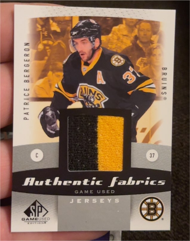 2010-11 Upper Deck SP Game Used Authentic Fabrics #AF-PB Patrice Bergeron — front