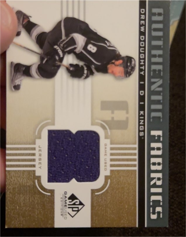 2011-12 SP Game Used Authentic Fabrics #AF-DD Drew Doughty — front