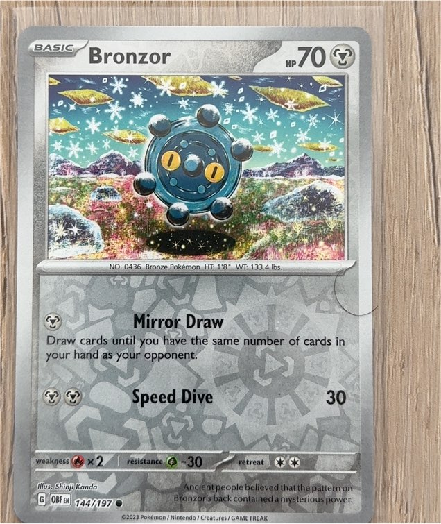 2023 Pokémon SV03: Obsidian Flames #144 Bronzor — front