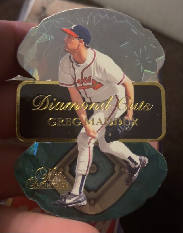 1997 Fleer Flair Showcase Diamond Cuts #10 Greg Maddux — front