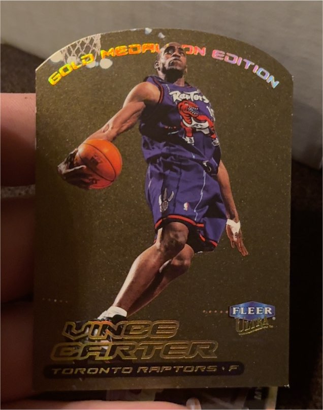 1999-00 Fleer Ultra Gold Medallion Edition #1G Vince Carter — front