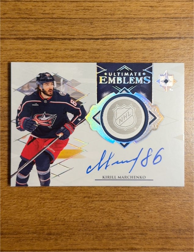2023-24 Upper Deck Ultimate Collection Ultimate Emblems #UE-KM Kirill Marchenko — front