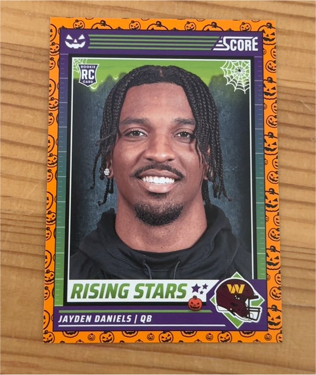 2024 Panini Score-A-Treat #26 Jayden Daniels Rising Stars Orange Pumpkins Rookie Card — front