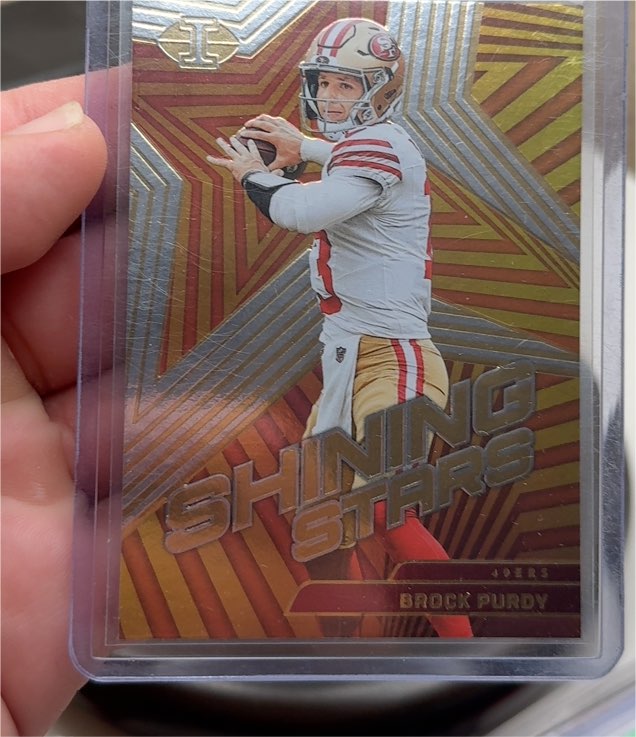 2023 Panini Illusions #2 Brock Purdy Shining Stars — front
