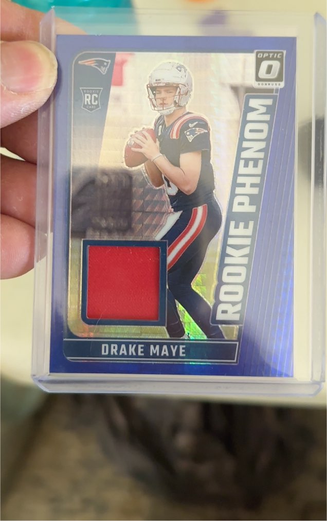 2024 Panini Donruss Optic #RPB-DME Drake Maye Rookie Phenom Blue Hyper Prizm — front